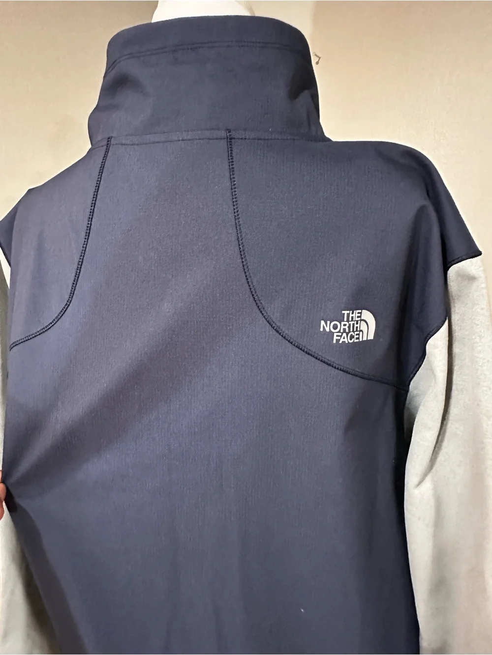 The North Face Navy with Light Gray Sleeve Softshell Jacket. Size L.